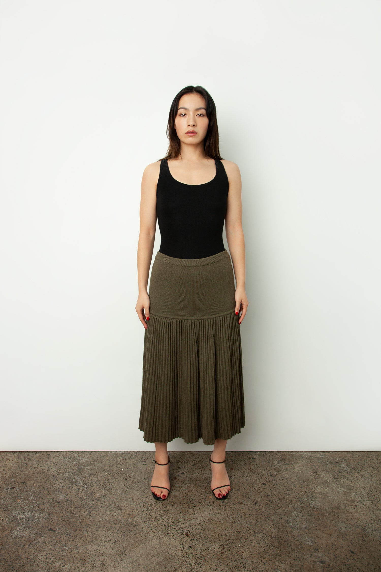 PLEATED KNIT SKIRT